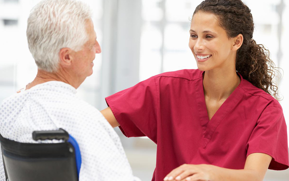 senior with healtcare staff